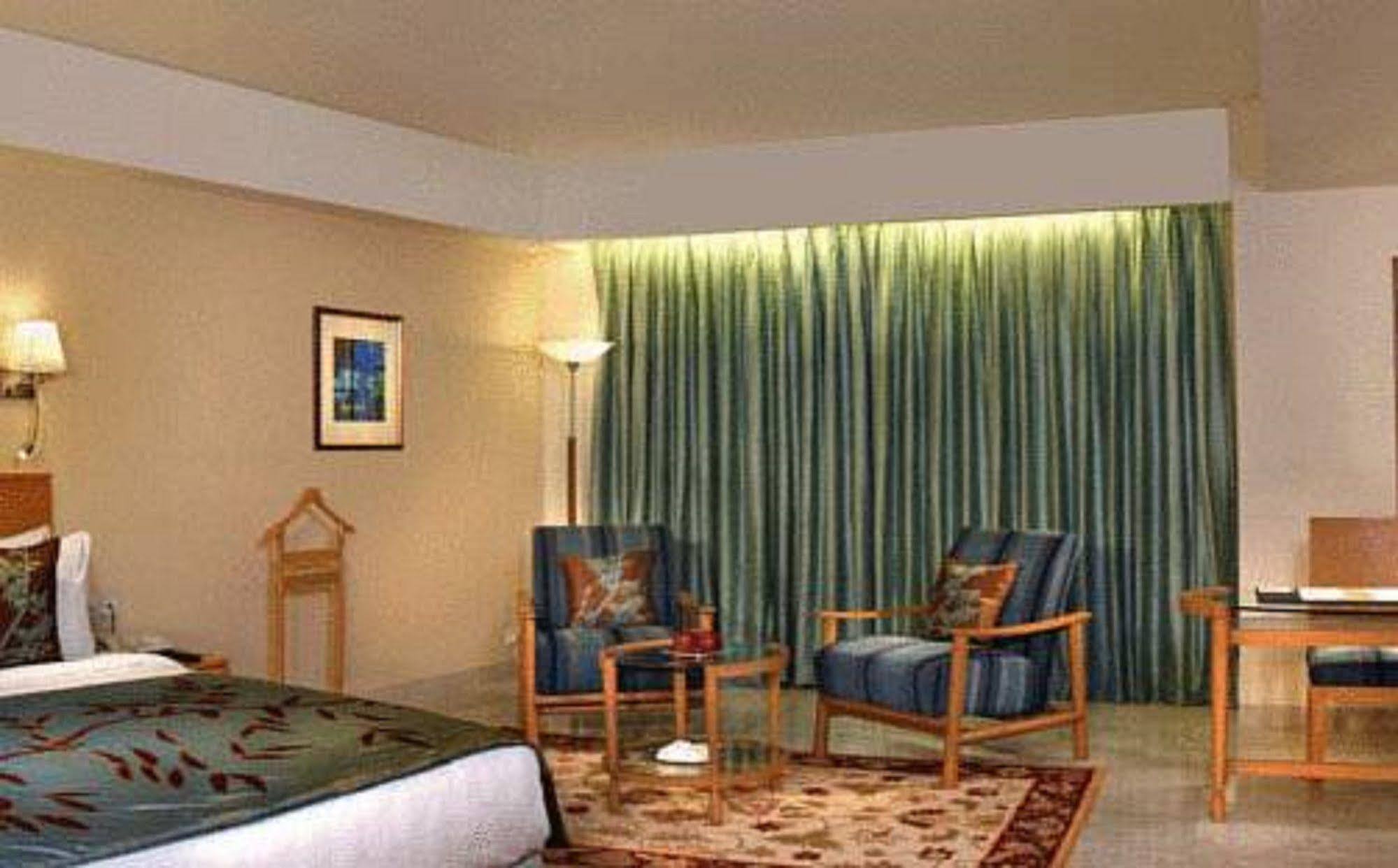 ฟอร์จูนพาร์คเลคซิตี้ Hotel ธาเน ภายนอก รูปภาพ